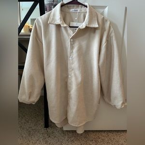 Pleated off white blouse